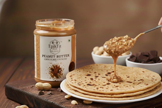 EpikFit Peanut Butter jar with a spoonful of peanut butter being spread on a tortilla.